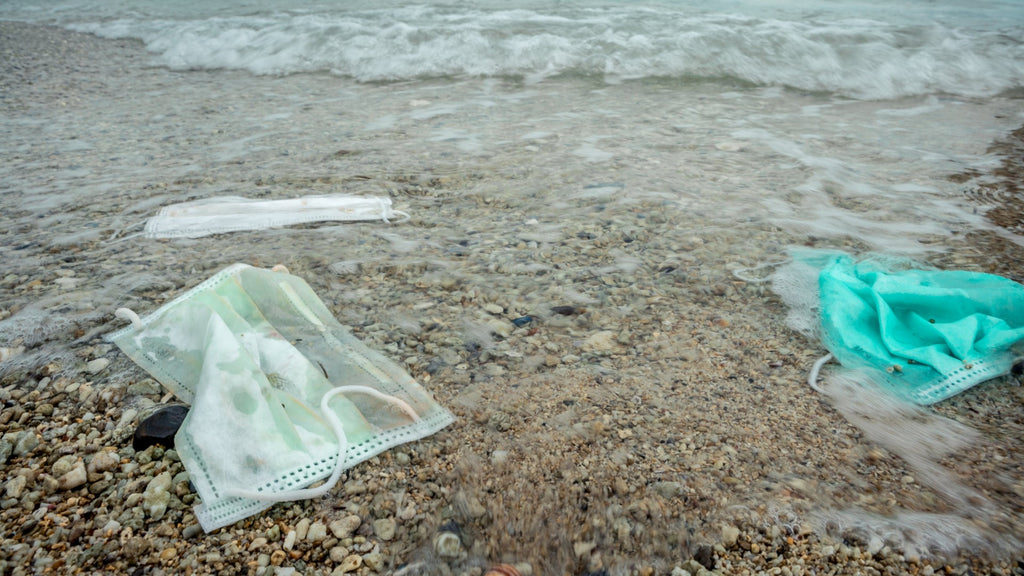 Disposable Face Masks In The Sand at a Beach | OCTO® Safety Devices