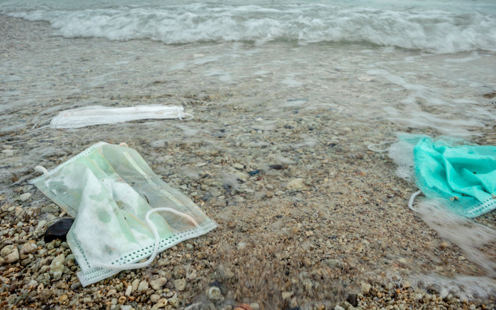 Disposable Face Masks In The Sand at a Beach | OCTO® Safety Devices